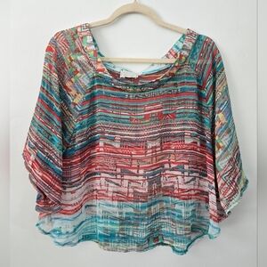 About a girl Bohemian Flowy Top. Size Medium. Good preowned condition.